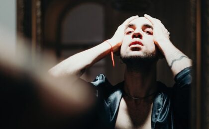 man facing the mirror