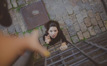 high angle photo of woman on ladder