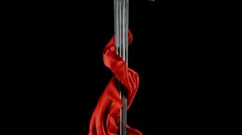 dagger with a blade wrapped in red silk