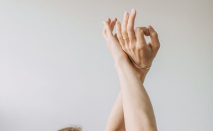 a woman stretching her arms