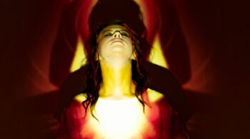 woman in red dress with red light