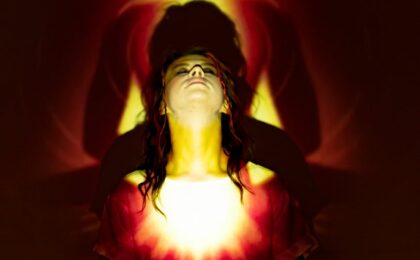 woman in red dress with red light